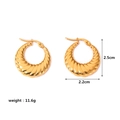 Macro view of gold croissant earrings showing 2.5cm height and spiral texture details - Spiral Croissant Hoops