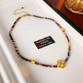 Detail view of colorful beaded necklace with a clover pendant inlaid with pearls - Colorful Flower Necklace(49#)