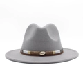 Detail of grey wool fedora hat featuring a bohemian woven band and golden cowrie shell - Light Gray