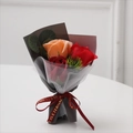 Detailed view of handmade mini soap rose bouquet with red and orange flowers and ribbon - Dark Gray