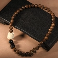 Bracciale in legno di sandalo a doppio giro con testa di leone e anelli di bronzo - Modello Leone a Doppio Giro in Legno di Sandalo Dorato da 8mm