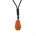 Detail of translucent orange crystal necklace with hexagonal cut and black braided cord - Red Agate