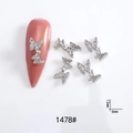 Macro detail of silver bow tie nail art charm with rhinestones and 12mm size markers - 1478# Silver Rhinestone Bowknot