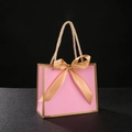 Pink paper gift bag with gold trim, large golden satin bow and rope handles for weddings - Pink Bag Gold Border + Gold Ribbon