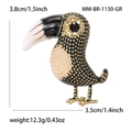 Broche oiseau toucan rétro colorée avec texture métallique or et noir sur fond blanc - Ventre Gris Multicolore
