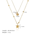 Collana a doppio strato in acciaio al titanio con ciondoli a stella marina e conchiglia - Collana a Doppio Strato con Stella Marina e Conchiglia