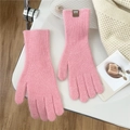 Detail of pink knitted glove with ribbed cuff and brown D.D leather patch on white surface - One Size / Pink