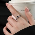 S925 sterling silver leaf ring with black gemstone on model finger closeup - JZ0671-Woven Black Stone