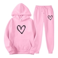Casual pink two-piece tracksuit featuring a hooded sweatshirt and joggers with heart prints - S / Pink