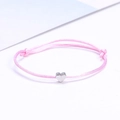Adjustable minimalist cord bracelet in pink with a small silver heart-shaped pendant - Pink/Silver