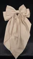 Elegant champagne silk bow hair clip with long ribbons in a soft satin finish - Light Champagne