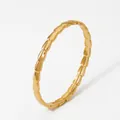 Polished golden stainless steel heart geometric bangle with segmented bamboo style design - Gold Trapezoid/Bamboo Style (KA1228)