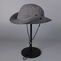Detail of dark grey sun hat with breathable metal eyelets and adjustable wind strap - M(56-58cm) / Gray