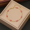 Macro detail of gold-plated stainless steel chain with red evil eye charms and clasp - Red Oval Evil Eye Style (2#)