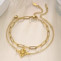 Dettaglio del bracciale a doppio strato in acciaio inox con ciondolo a quadrifoglio - Colore Oro - Catena Combinata