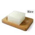 Handmade rice milk soap bar on a minimalist bamboo draining tray for skincare - Rice Soap (Naked Soap)