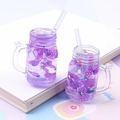 Macro detail of miniature purple mason jar charms with ice cubes and grape decor - Purple Straw Cup