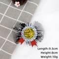 Detail of graduation party hair clip showing 9.5cm length and shiny sequin ribbon textures - Graduation Badge