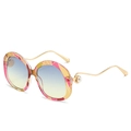 Lunettes de soleil rondes à motifs géométriques colorés et branches dorées à perles - Monture Rose Verres Bleu-Vert