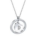 Detailed macro view of silver stainless steel heart pendant with engraved letter D - Letter D