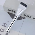Silver foundation brush with black bristles and protective sleeve on artistic background - Foundation Brush / OPP Bag