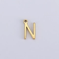 Detailed view of a minimalist golden stainless steel letter N charm on white background - N (Bracelet Accessory) / Gold