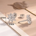 Elegant silver snowflake stud earrings with sparkling cubic zirconia on a warm background - Single Piece Style (A332)