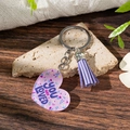Portachiavi a cuore viola in acrilico con scritta Love You e nappa su pietra rustica - YOU ARE LOVED (24060424-Stile 2)