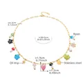 Detail of adjustable golden necklace featuring colorful resin mushroom and daisy pendants - Golden Strawberry Style (P2187)