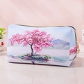Floral print PU leather makeup bag with cherry blossom design and gold zipper - White Background Cherry Blossom Tree