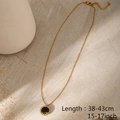 Detailed close-up of a gold LUCK pendant necklace with measurements 38-43cm length - LC40014-love Gold LUCK Disc Necklace
