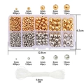 Dettaglio del kit perline fai-da-te con perle tonde oro e argento e cordoncino elastico - Scatola a 10 scomparti (Perline rotonde CCB Oro e Argento 3-10mm Circa 1250 pezzi)