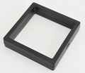 Macro shot of a black square jewelry display box with a transparent film insert - Black PE Film Display Box
