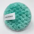 Mint green round microfiber makeup remover puff with white Clean Sponge tag detail - Pineapple Grid Green