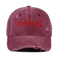 Detailed close-up of vintage distressed baseball cap with gothic LOSTMYHEAD embroidery - One Size / Burgundy