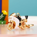 Rhinestone motorcycle keychain in gold, white and black metal with enamel finish - Motorcycle Black White