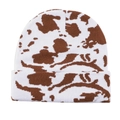 Detail of soft leopard pattern knitted beanie showing premium warm winter fabric texture - White Brown Pattern