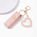Pink leather lipstick case keychain with heart-shaped mirror and gold hardware - Pink