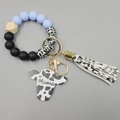 Silicone bead keychain bracelet with cow print leather tassel and Mama cow tag - Light Blue