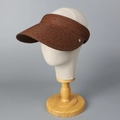 Close-up of dark brown raffia sun visor featuring a detailed weave and silver flower buckle - M(56-58cm) / Coffee (with Flower Buckle Decor)