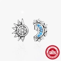 Asymmetric S925 sterling silver sun and moon stud earrings with sparkling blue zircon - Asymmetric Sun Moon Zirconia