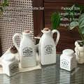 4-piece ceramic oil and vinegar dispenser set with salt and pepper shakers in white glaze - 6110 Ceramic Spice Jar 4-Piece Set