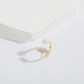 Golden open ring with white pearl and sparkling crystal pavé geometric detail - Three-row White Zircon / Gold