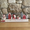 Wooden Christmas advent calendar featuring a Santa Claus motif and a sliding red truck marker - Santa Claus Countdown