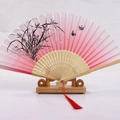 Japanese style folding fan with pink gradient silk and light bamboo frame on stand - White Ribs Style 16