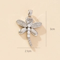 Detailed view of dragonfly pendant with dimensions of 3cm by 2.1cm and zircon stones - Style N