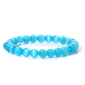 Elegant 8mm blue cat eye stone beaded bracelet featuring a shimmering feline effect - Blue Cat's Eye