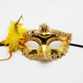 Golden Venetian lily masquerade mask with yellow feathers, lace flowers and sequins - Gold
