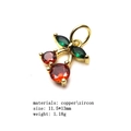 Macro detail of cherry pendant with red and green cubic zirconia in copper setting - 15#
