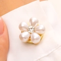 Macro shot of a five-petal pearl flower shirt clip with a sparkling center zircon - 14K Gold Pearl Five-Petal Flower Style (1706)